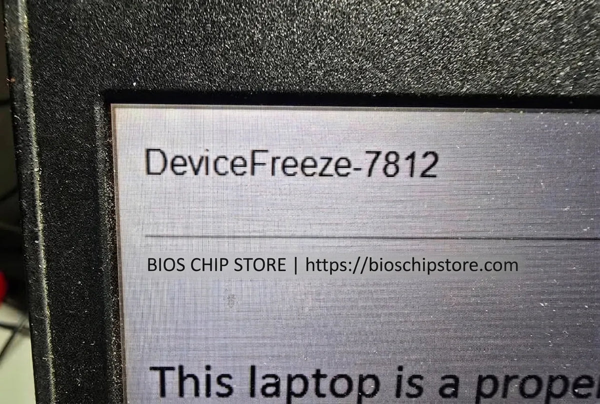Lenovo ThinkPad laptop screen locked with an Absolute Computrace Device Freeze alert message.